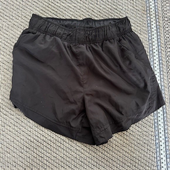 two pocket running shorts with build in underwear - Picture 5 of 5